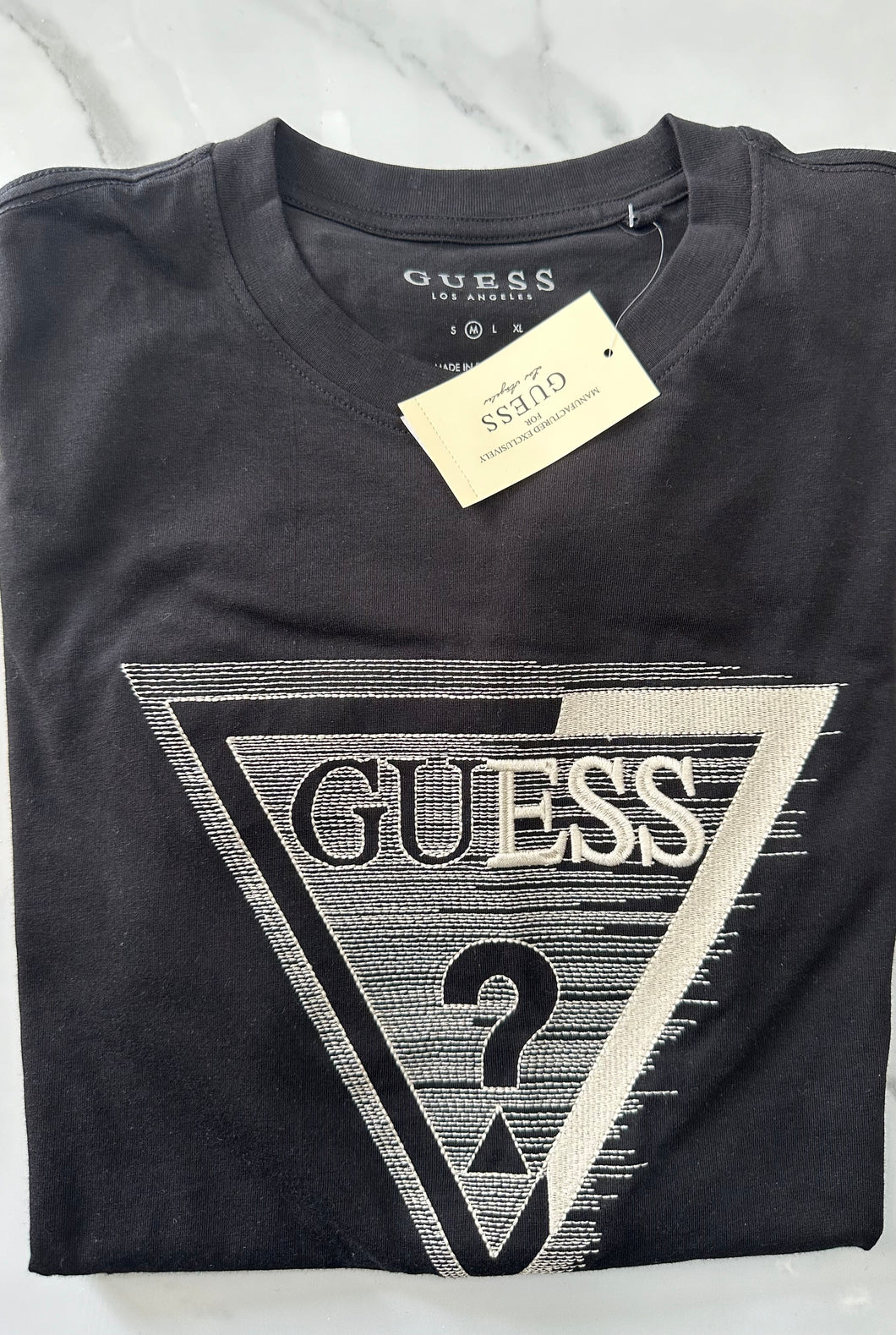 Guess cuello